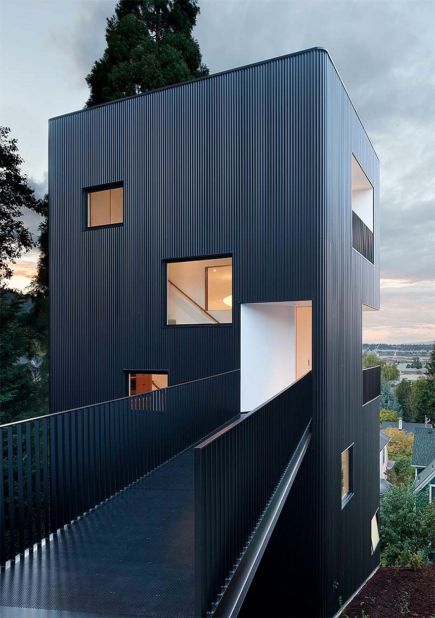 Modern Vertical House Accessed by a Steel Pedestrian Bridge-1