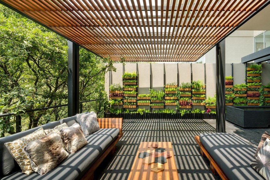 Jardin Apartment Provides a Close Connection of Living Spaces with Patios and Interior Gardens-12