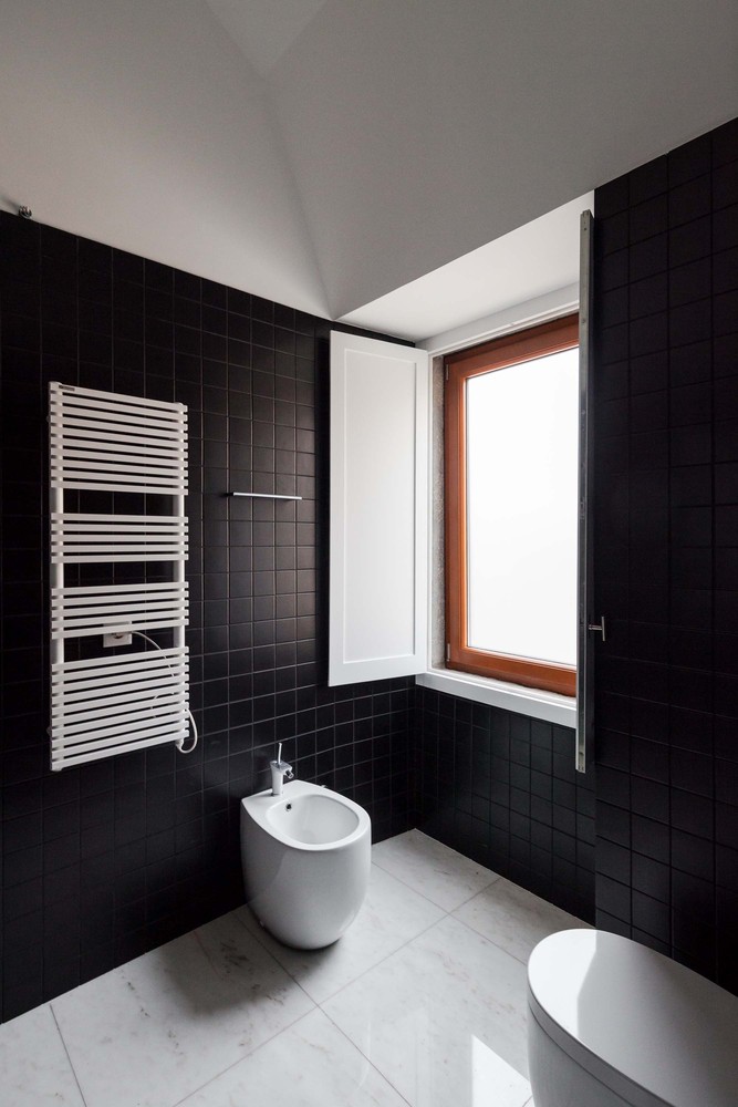 里斯本洛里什住宅 · 旧建筑新生命,彩色空间营造生活美学-32