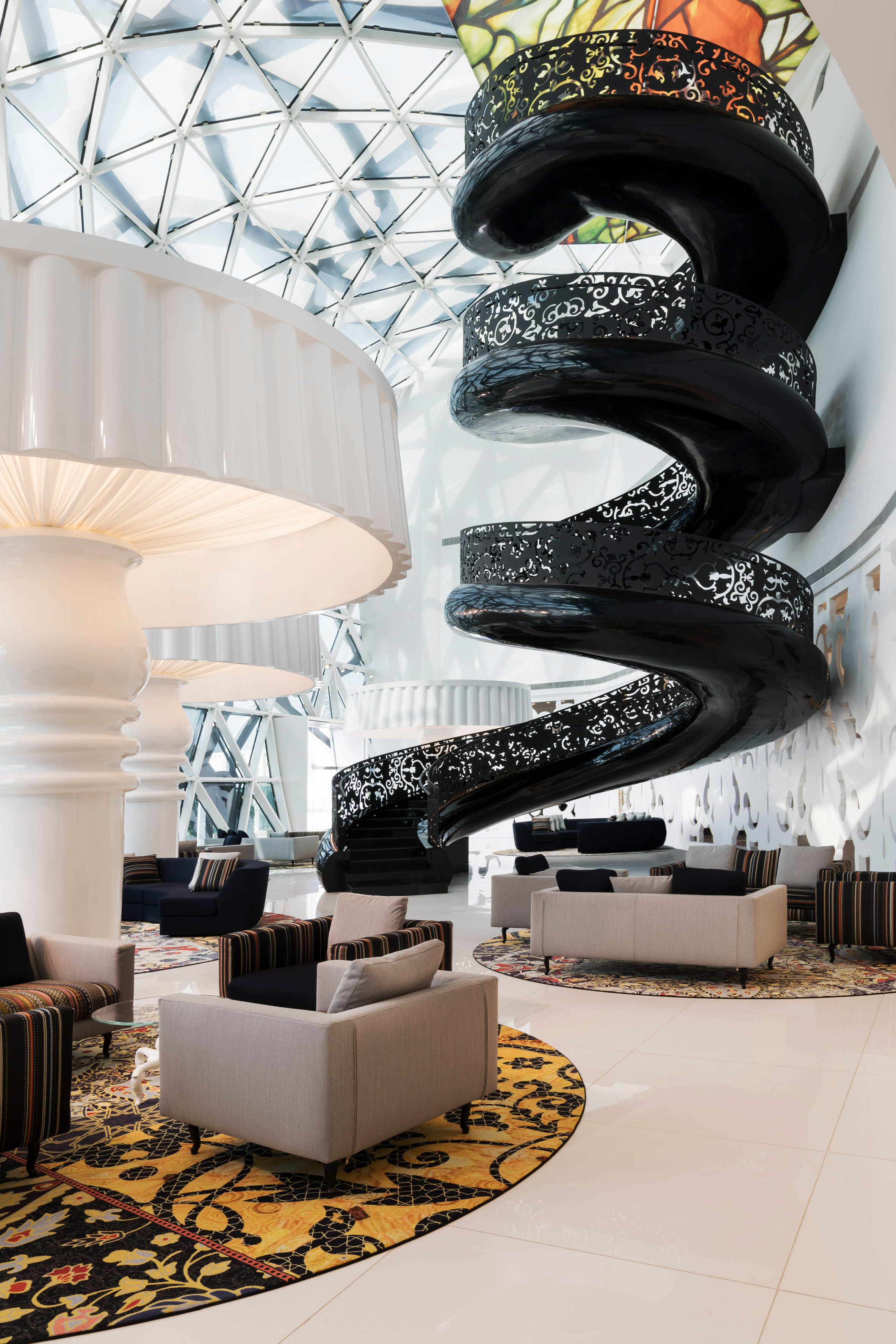 Marcel Wanders uses clashing patterns and oversized furniture for hotel-13