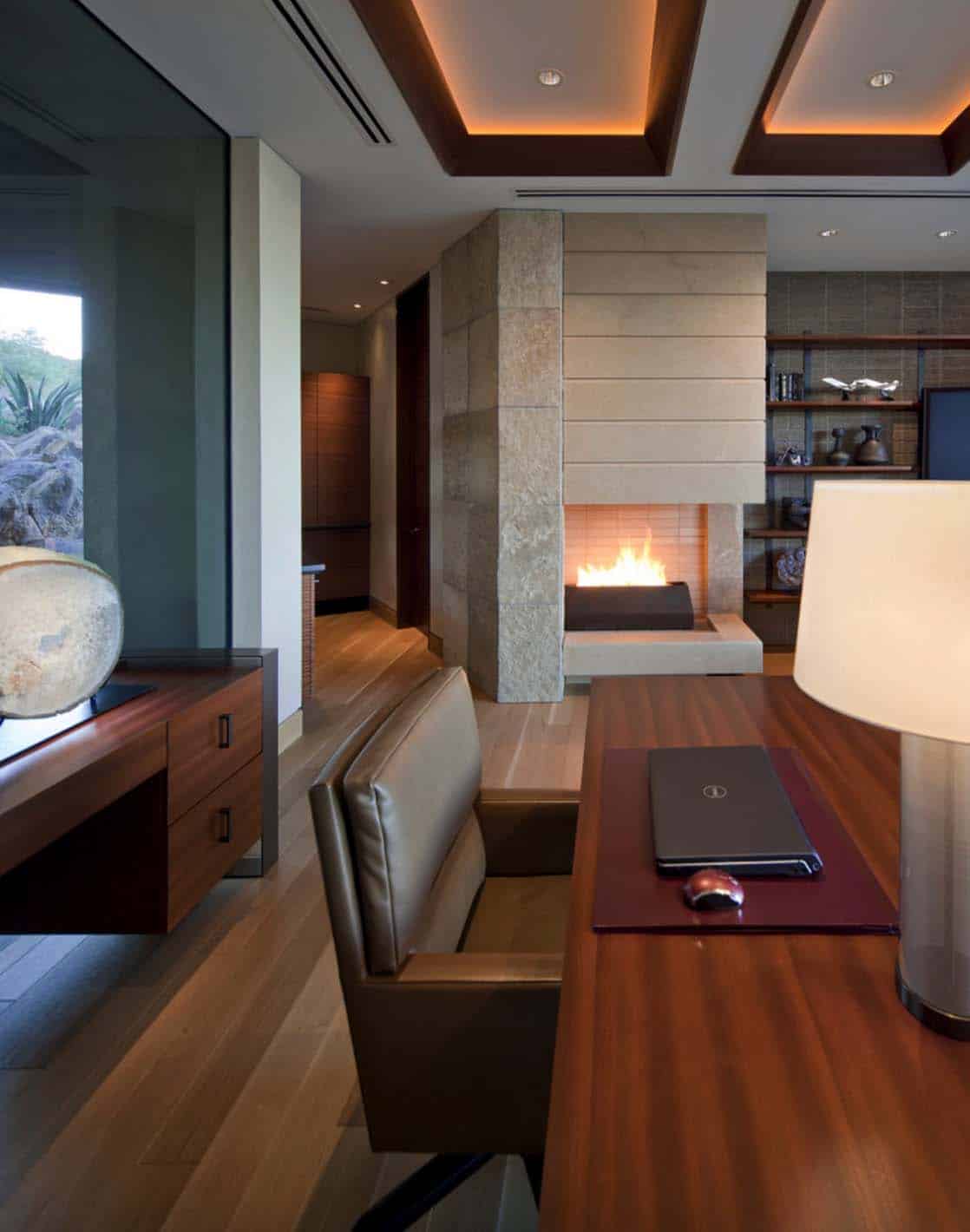 Modern desert home set on a rocky hillside with spectacular city views-14