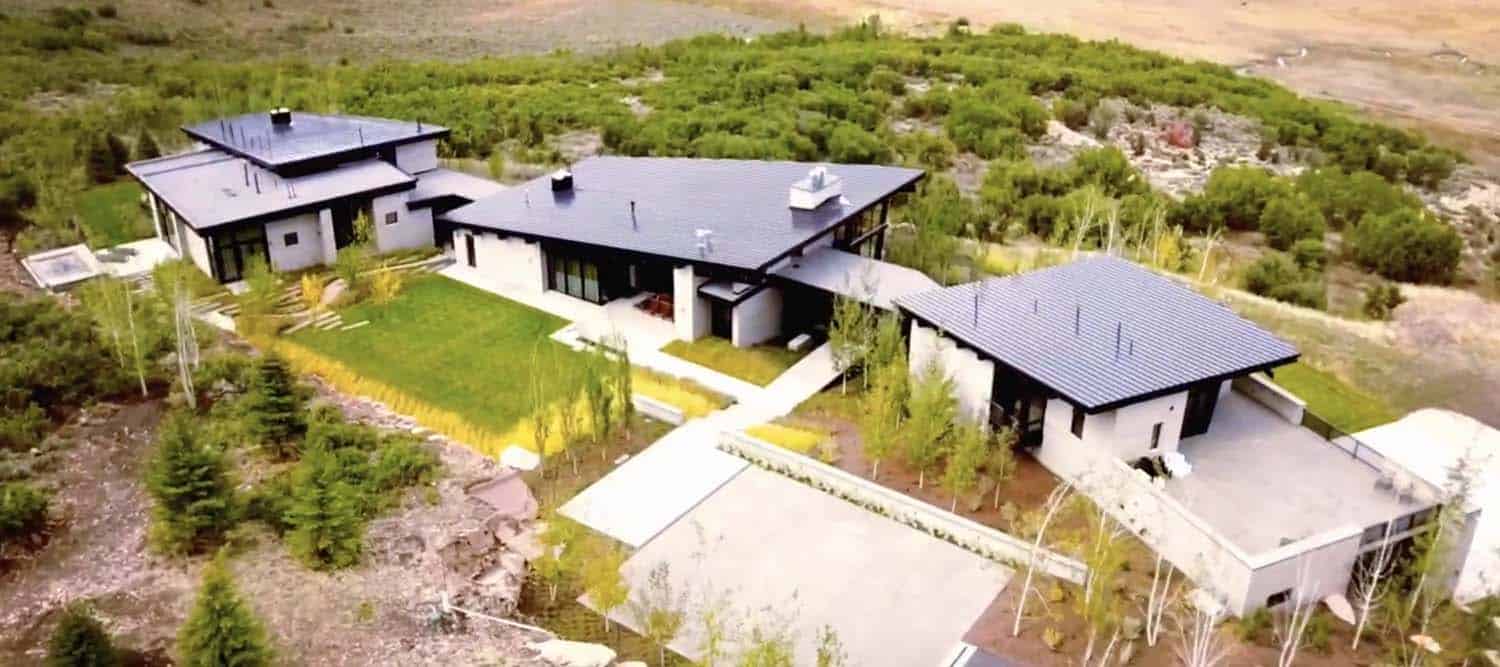 Majestic mountain home of stone and glass dominates its Utah landscape-28