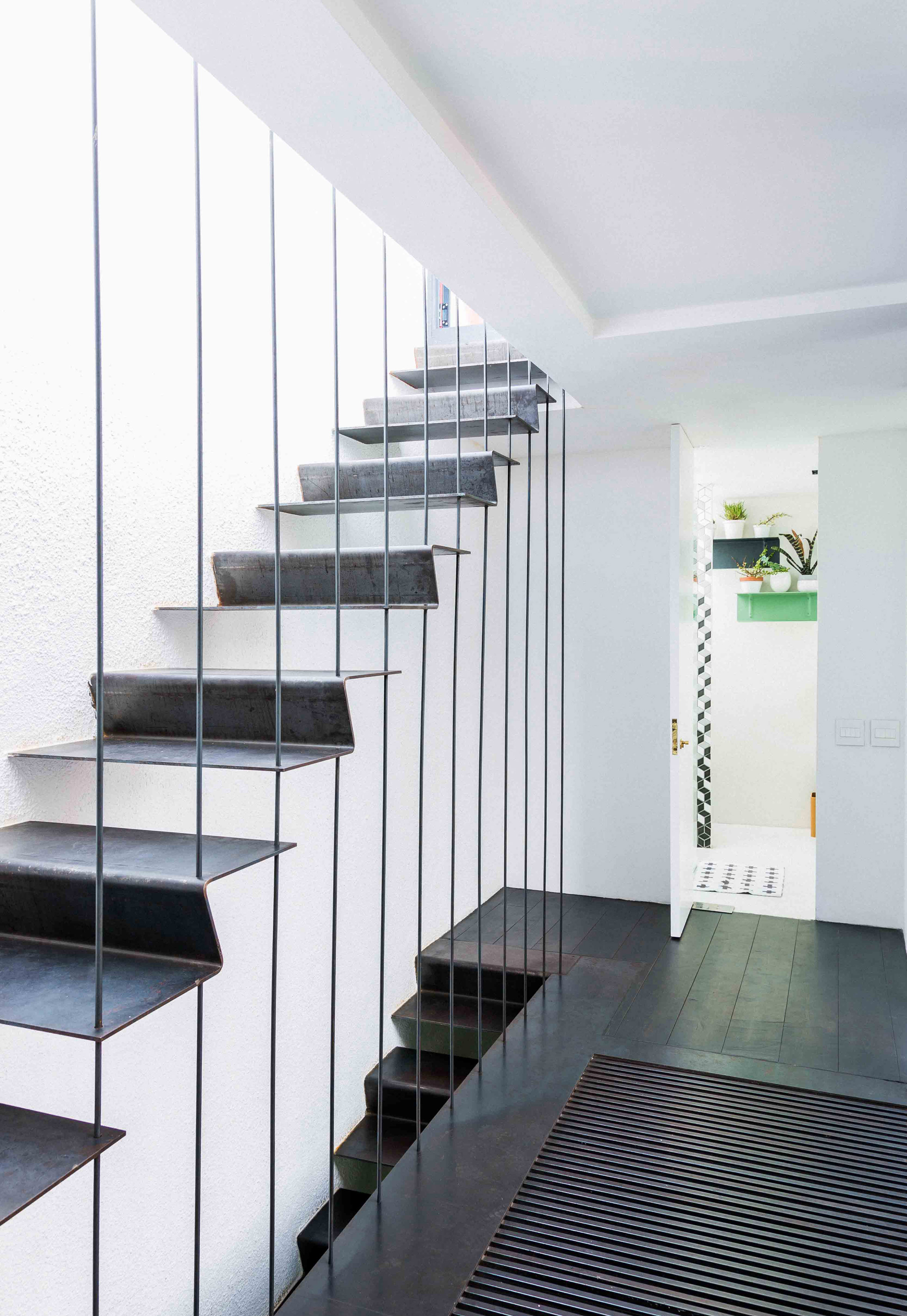 Rooftop pool and vertical garden feature in Fold Architects' pink Cape Town house-14