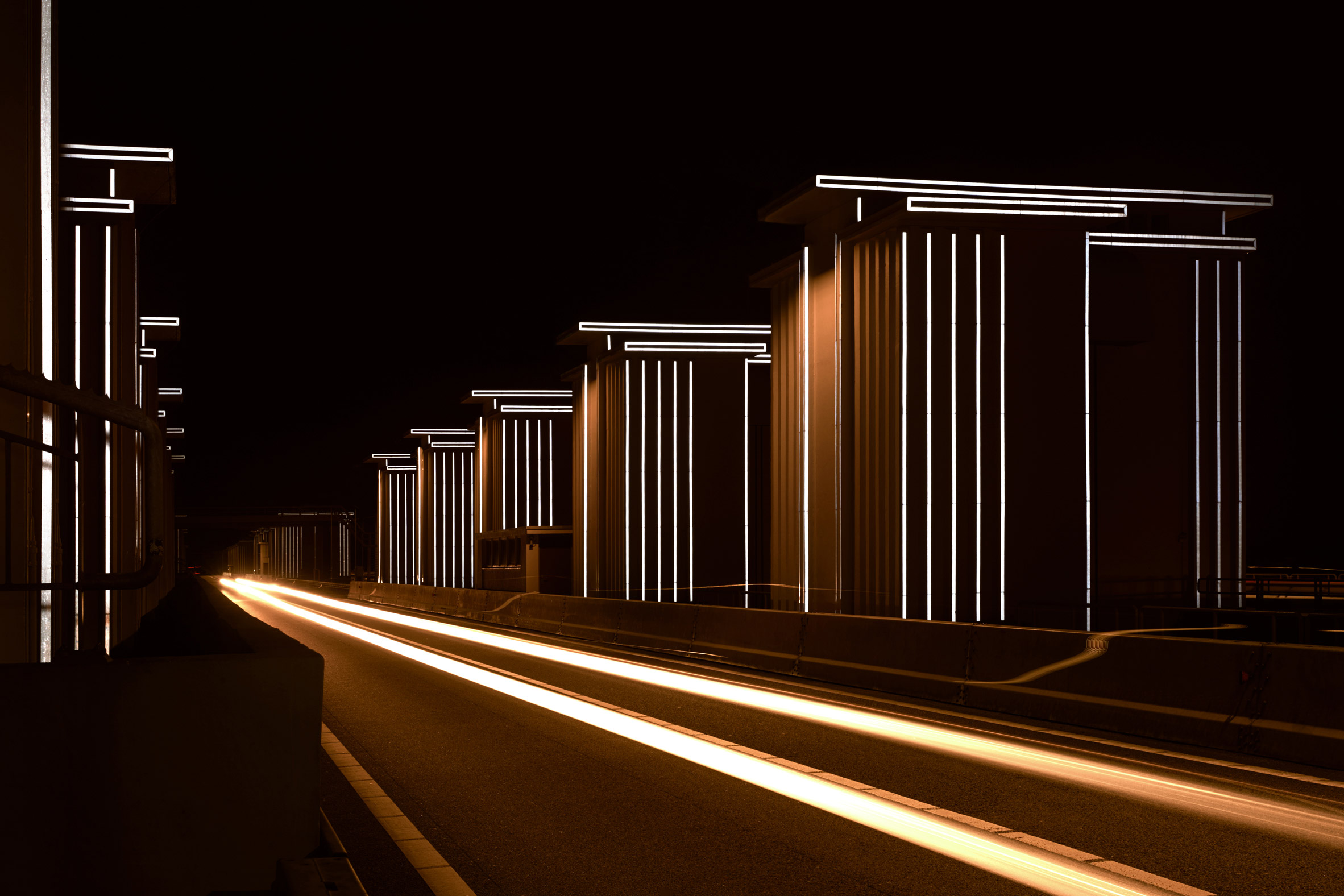 Restored floodgates by Studio Roosegaarde reflect the headlights of cars-2