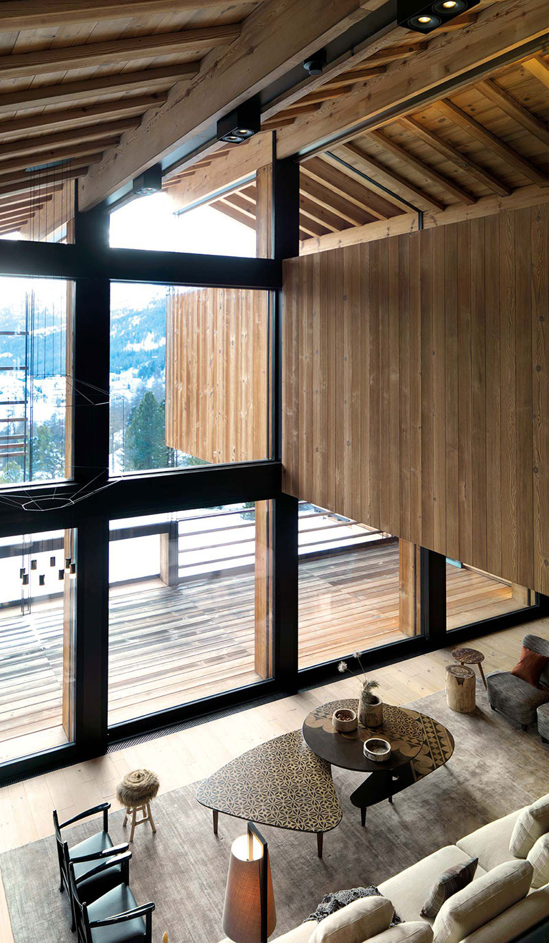 现代瑞士阿尔卑斯山滑雪坡旁小木屋-5