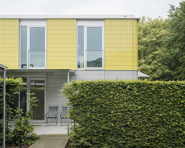 House + Workshop by studio MOTO | Sustainable Design with Harmonious Yellow Tile Facade-1