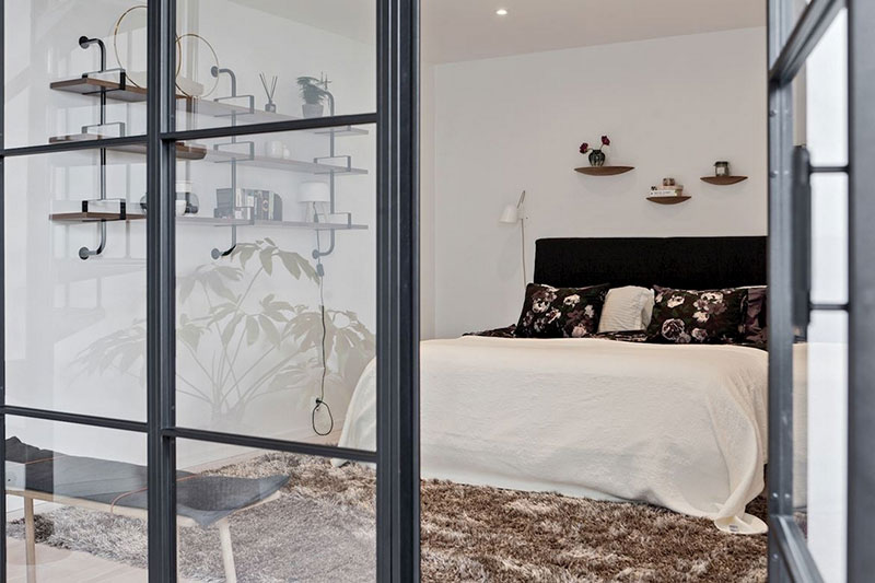 瑞典顶层阁楼 | 木梁与极简主义的完美融合-8