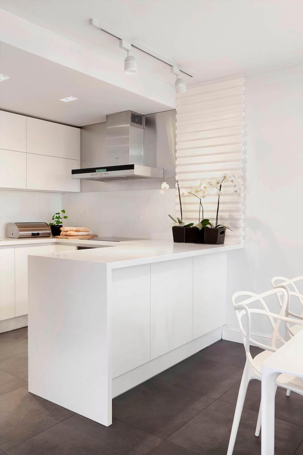 E2 Apartment designed in white and grey with a touch of a wood paneling around fireplace by Tchenguelieva Staynov Architects   CAANdesign  Architecture and home design blog-7