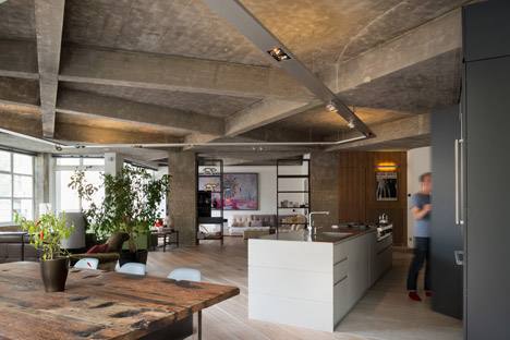 Apartment by Inside Out Architecture features chunky concrete beams-4