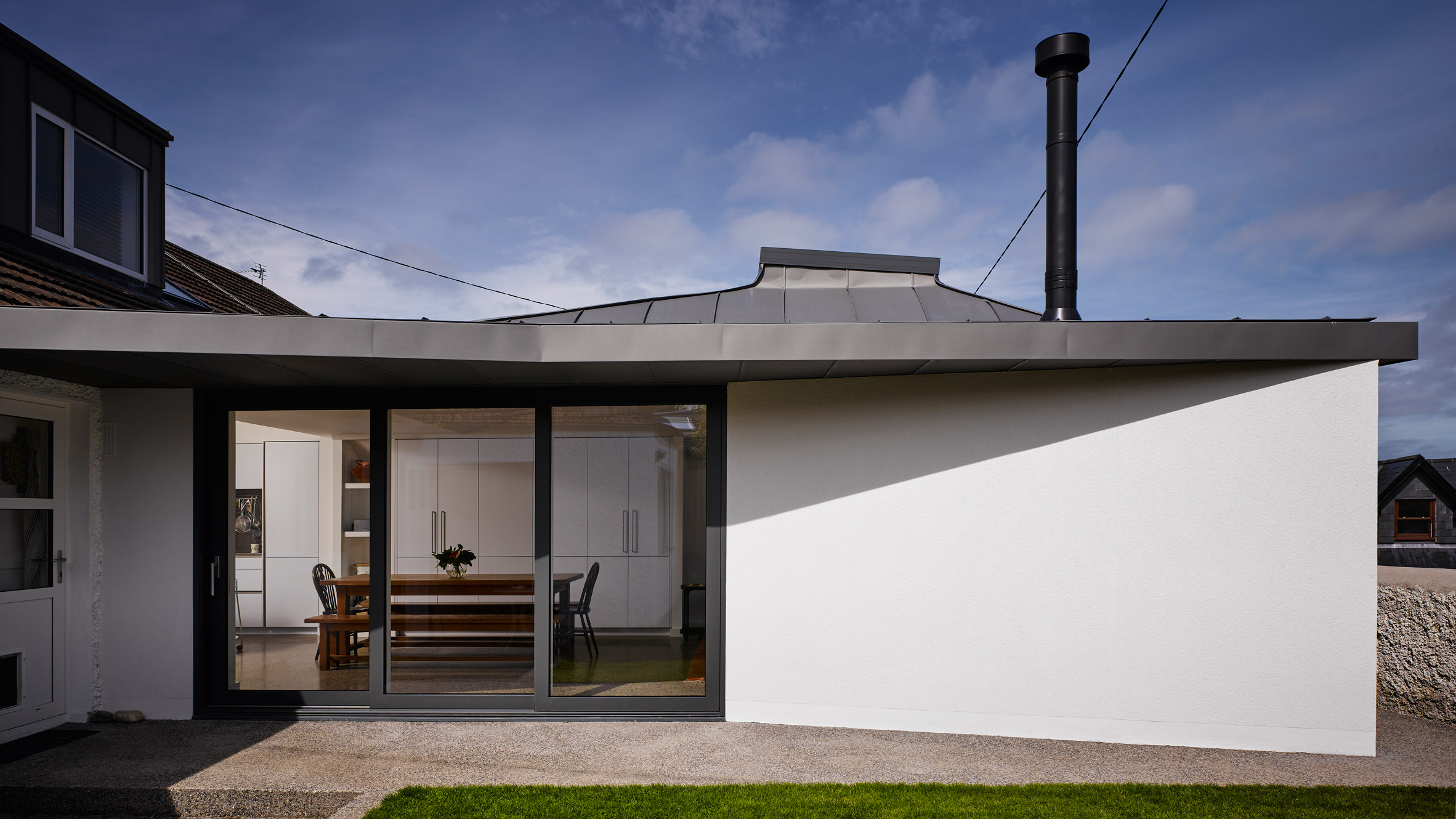 Zinc-clad roof tops extension to Dublin house by Arigho Larmour Wheeler-0