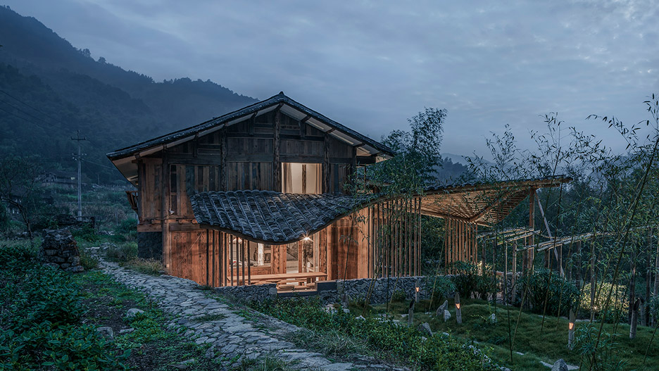Wavy roof of Chinese guesthouse follows outline of surrounding mountains-0