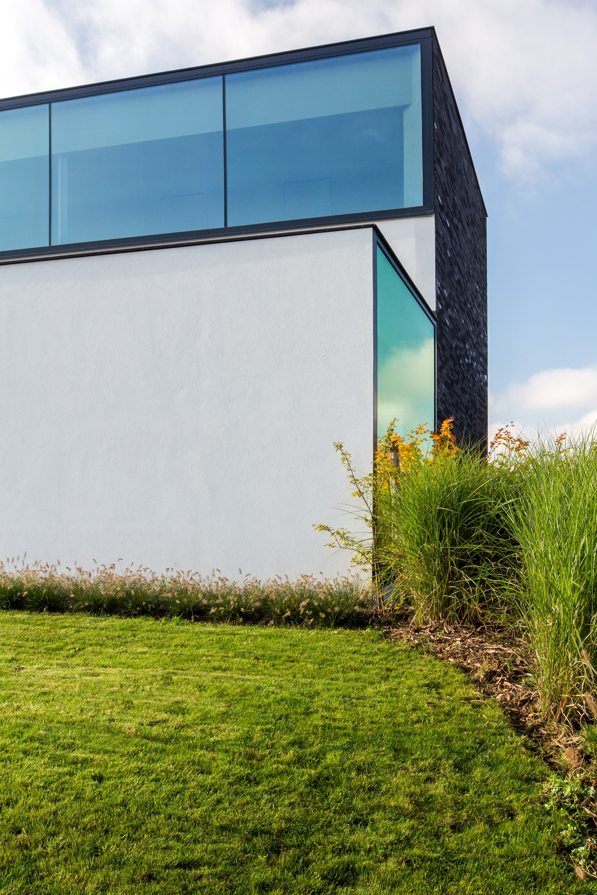 比利时比耶贝克新家庭住宅，简约生活与自然美景的融合-4