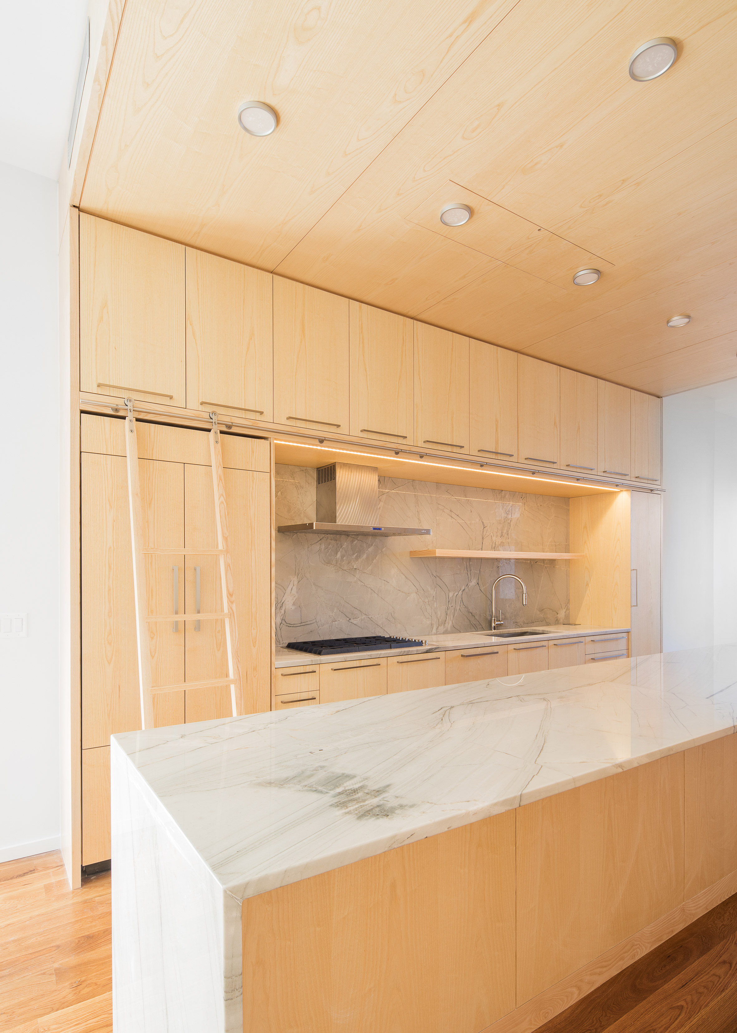 Jeff Jordan pairs white marble and pale pine in Jersey City house renovation-6