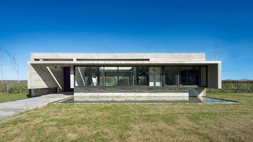 Spectacular Concrete House Surrounded by Fields and Vegetation-3