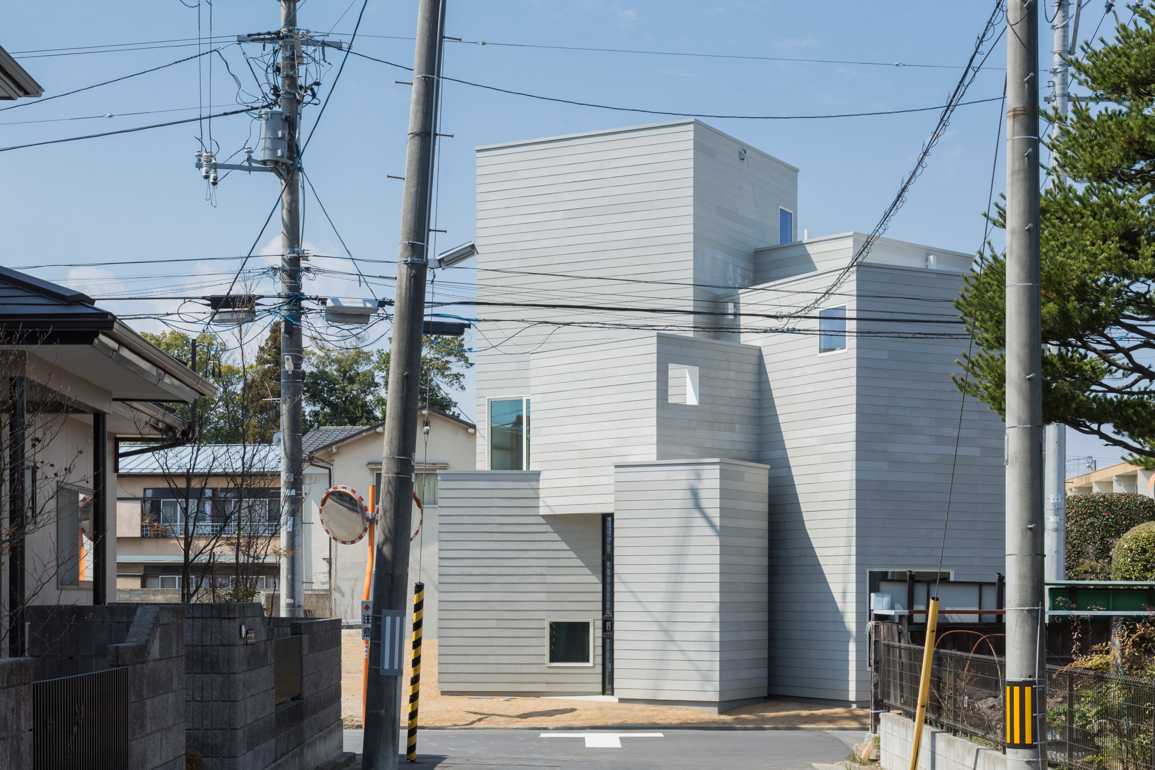 Cohta Asano builds his new Fukushima home as a cluster of nine cuboids-7
