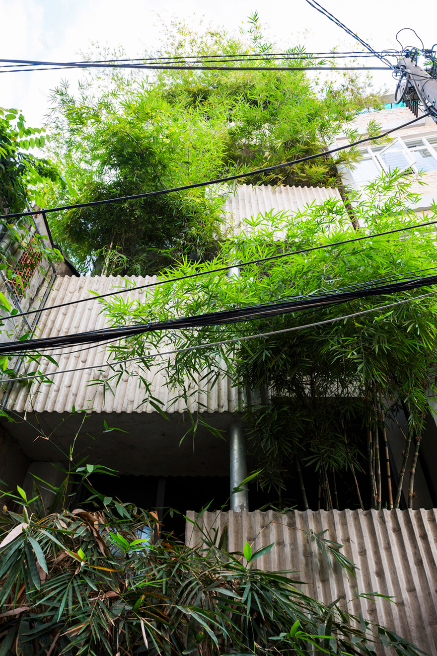 Vo Trong Nghia fronts narrow house in Vietnam with huge bamboo plant boxes-7