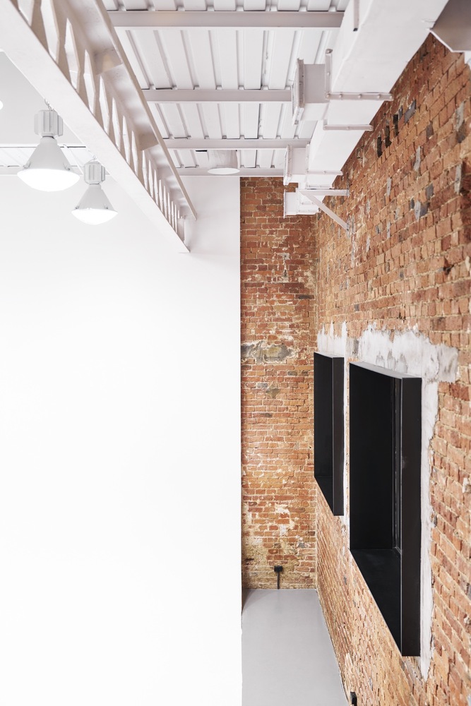 波兰华沙摄影棚改造,工业风与现代化的完美结合-24