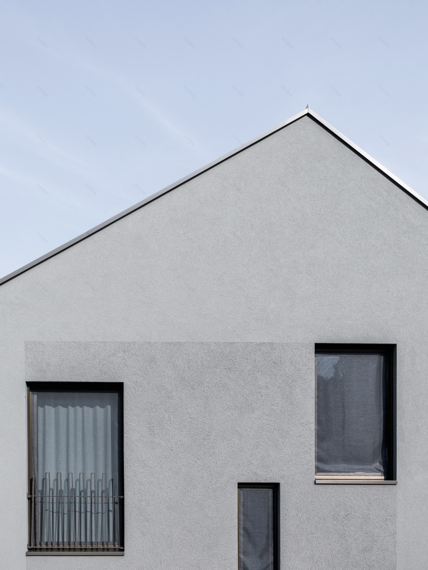 Swiss housing takes cues from mountainous landscape with zig-zag roof-11