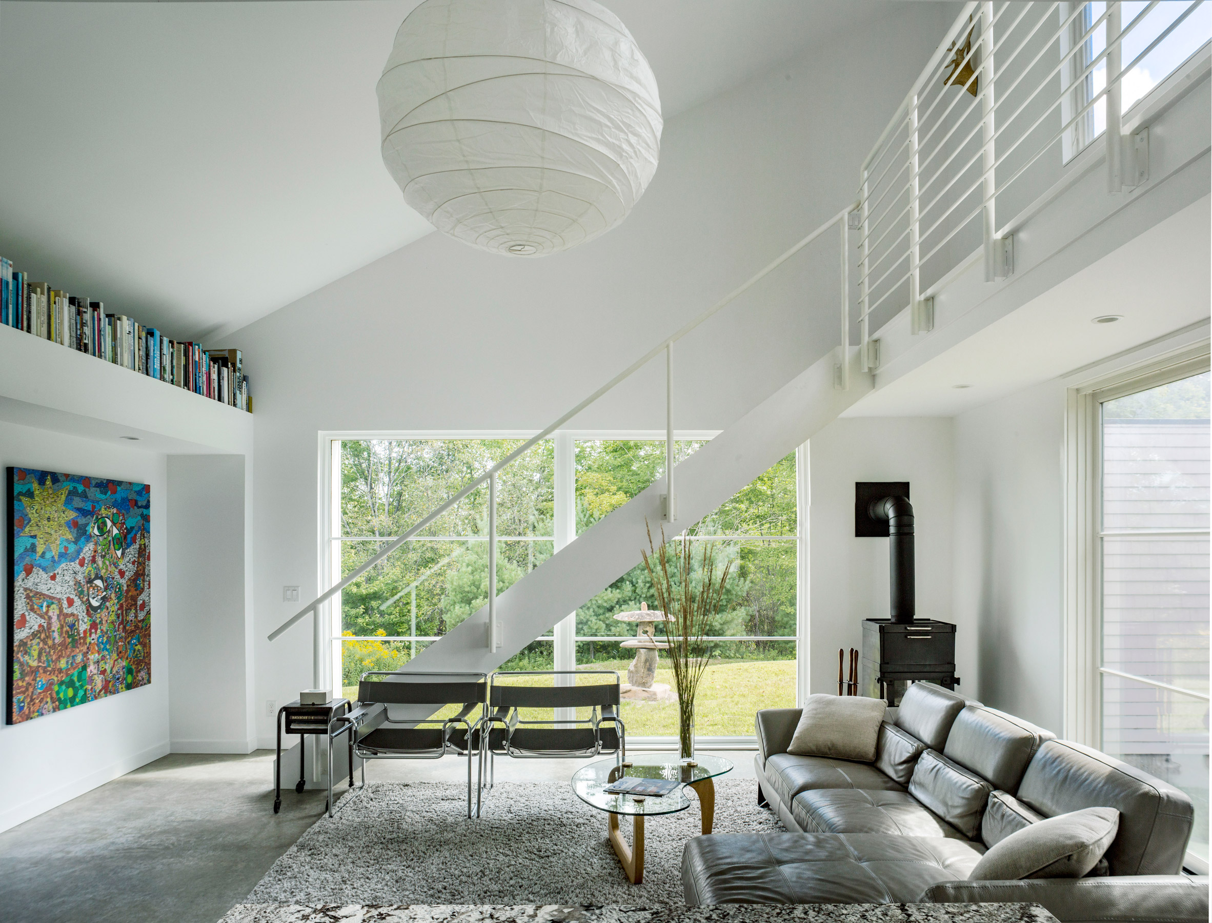 Two white volumes frame central courtyard of Vermont home by Birdseye Design-9