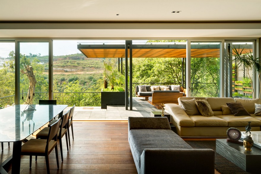 Jardin Apartment Provides a Close Connection of Living Spaces with Patios and Interior Gardens-18