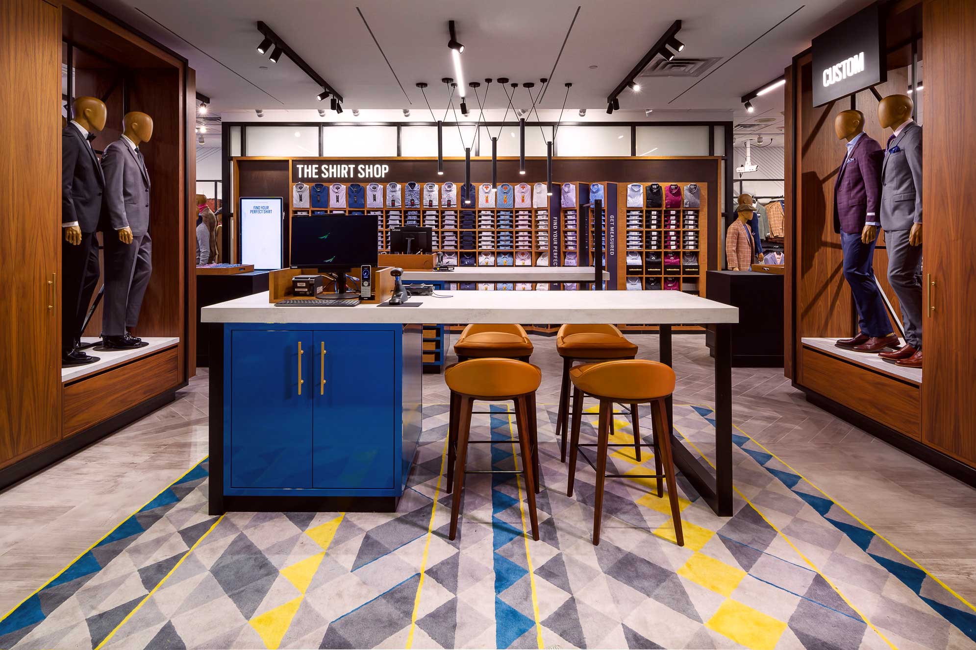 纳尔逊环球为男士服饰店设计新店铺概念-6