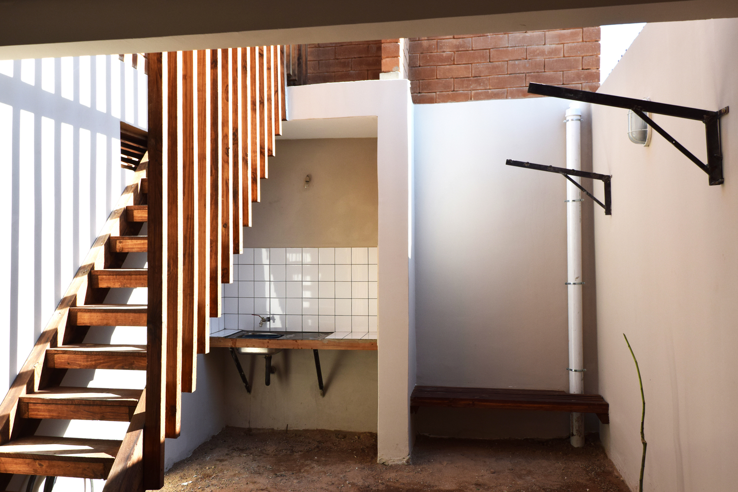 Compact Housing in the Informal Settlements of Maputo  Casas Melhoradas-31