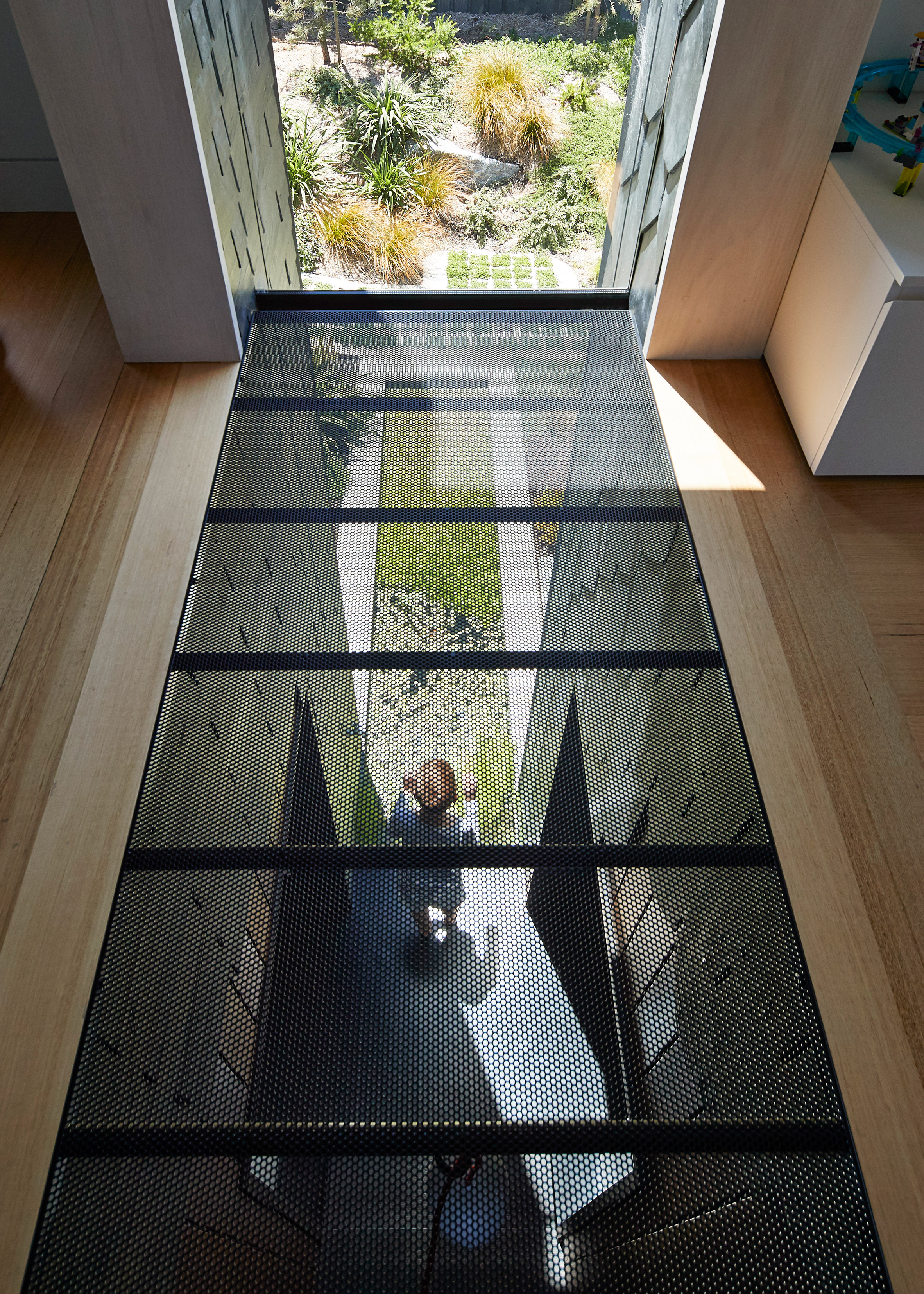 Diamond, scalloped and brick-shaped shingles cover Melbourne house by Austin Maynard Architects-22