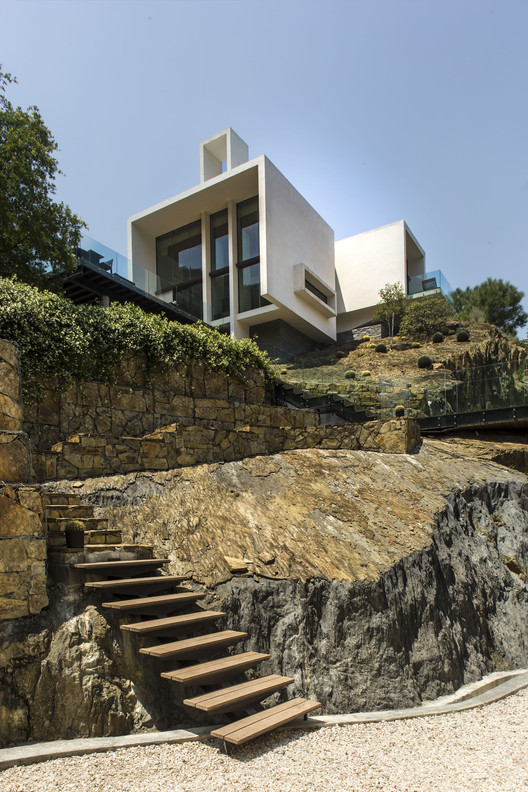 墨西哥山间混凝土住宅的透明与渗透-2