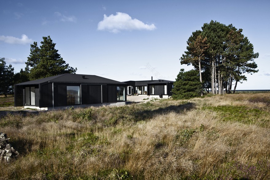 Modern Wooden House with Clean Lines and a Transparent Design-1