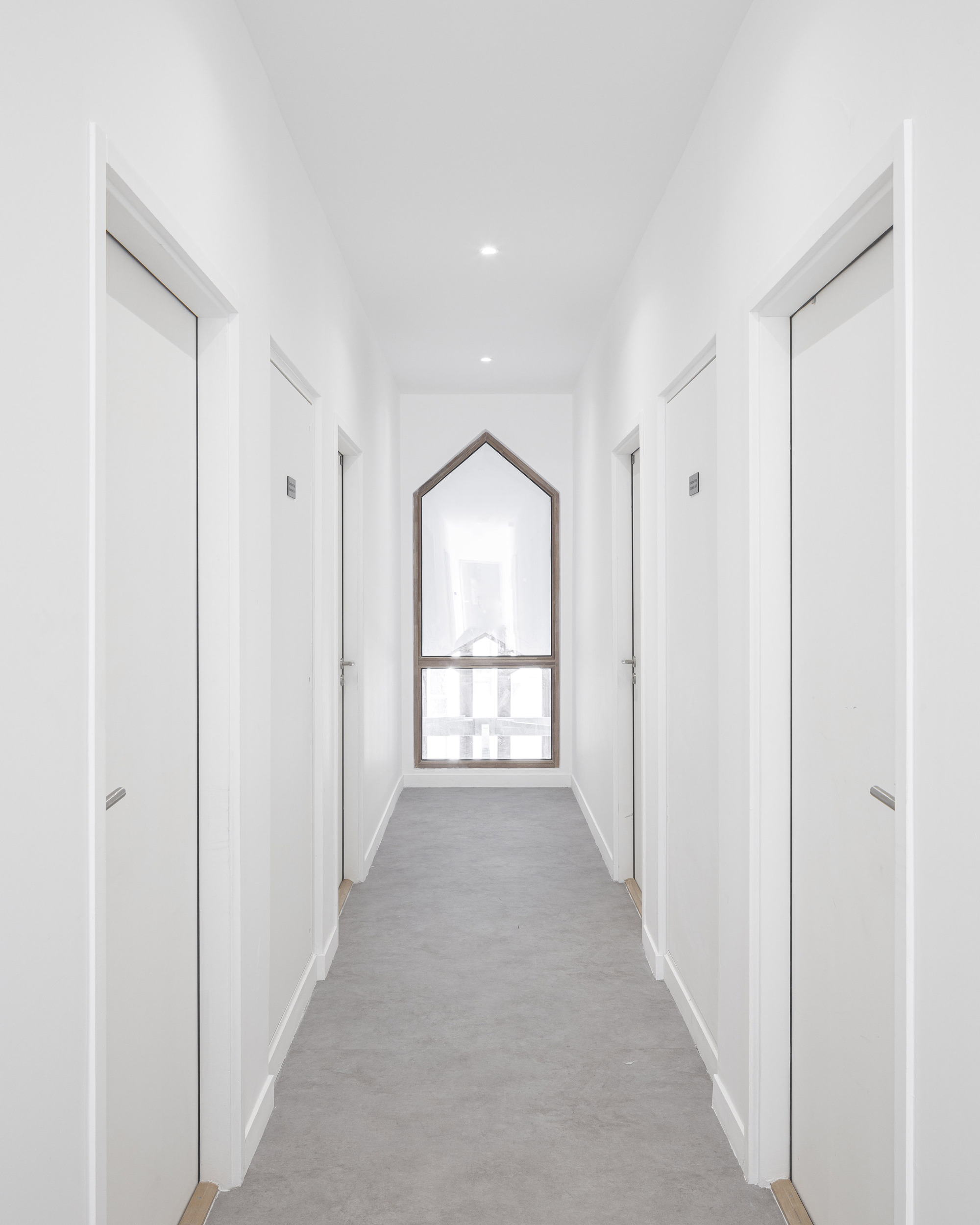 From Old Chapel to Thrift Shop and Social Housing / Tectône-40