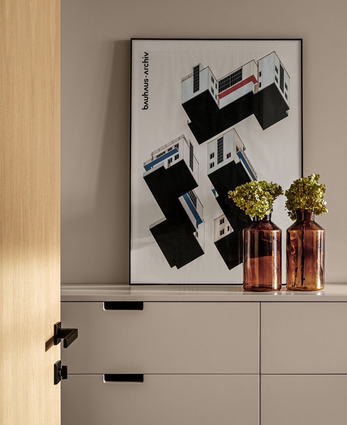 Green L-shaped Kitchen in Kyiv Apartment by Nadya Chabannaya - InteriorZine-6