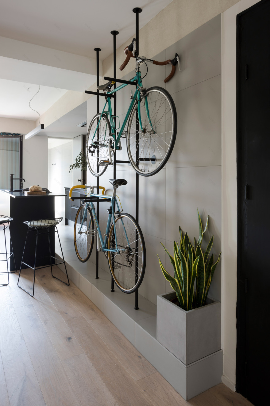 Bespoke storage creates room for bicycles in renovated Barcelona flat-2