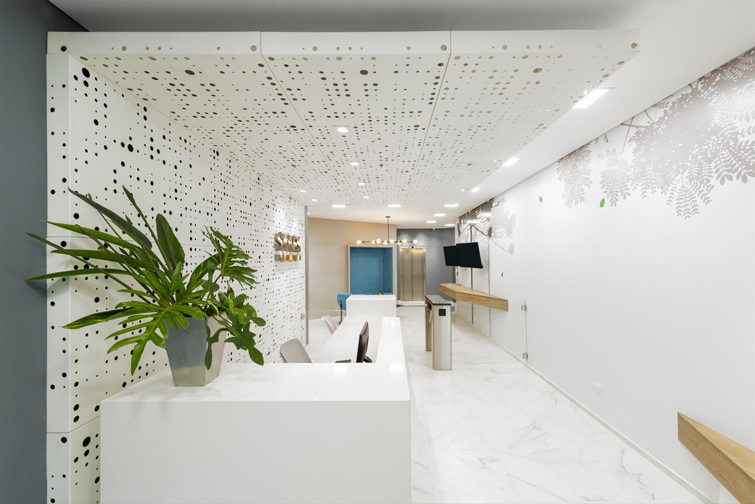 Sykes 办公室 | 激光穿孔金属板打造科技感接待区-2