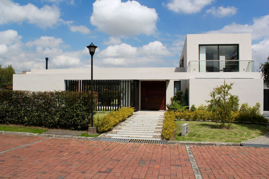 哥伦比亚 L 型别墅 · Campuzano Arquitectos 的室内外一体化设计-20