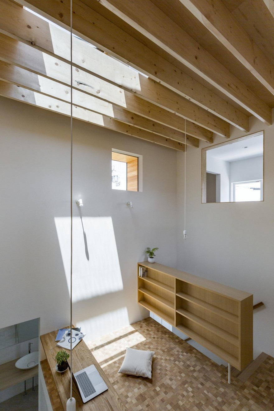 Box-Shaped Japanese Home with Warm Minimalist Interior Design-15