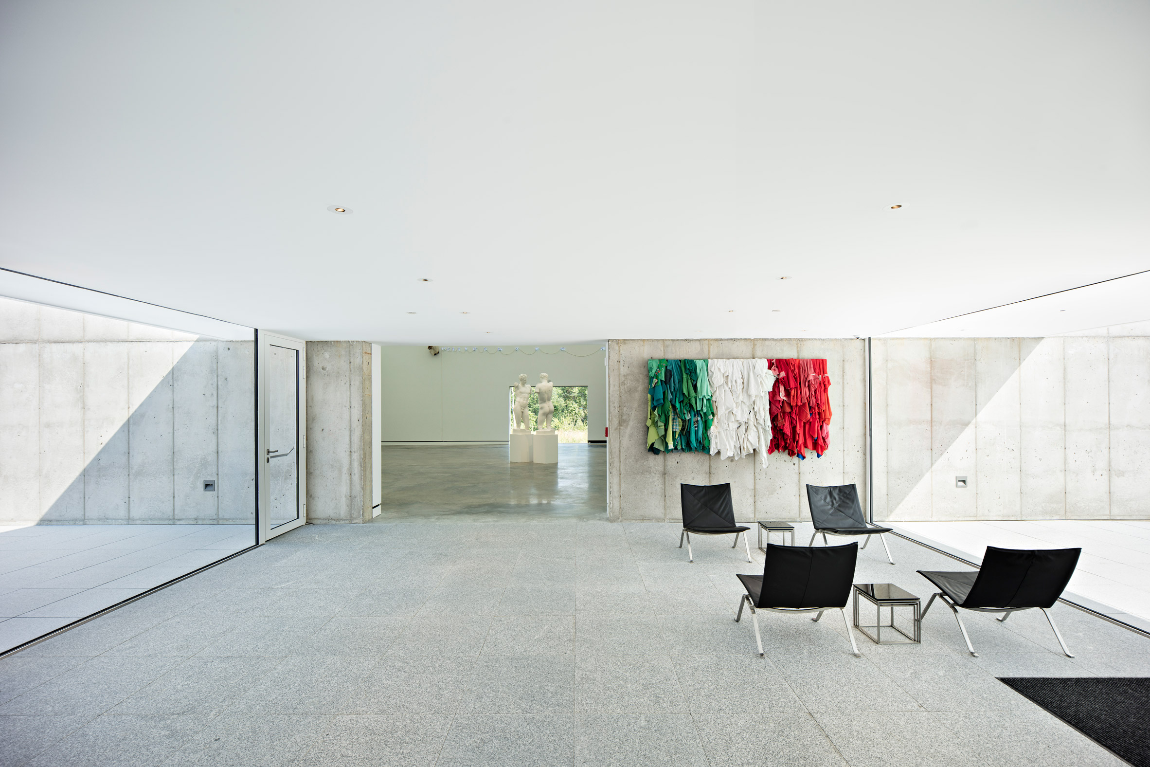 Crisp concrete forms house galleries for Italian art in upstate New York-12