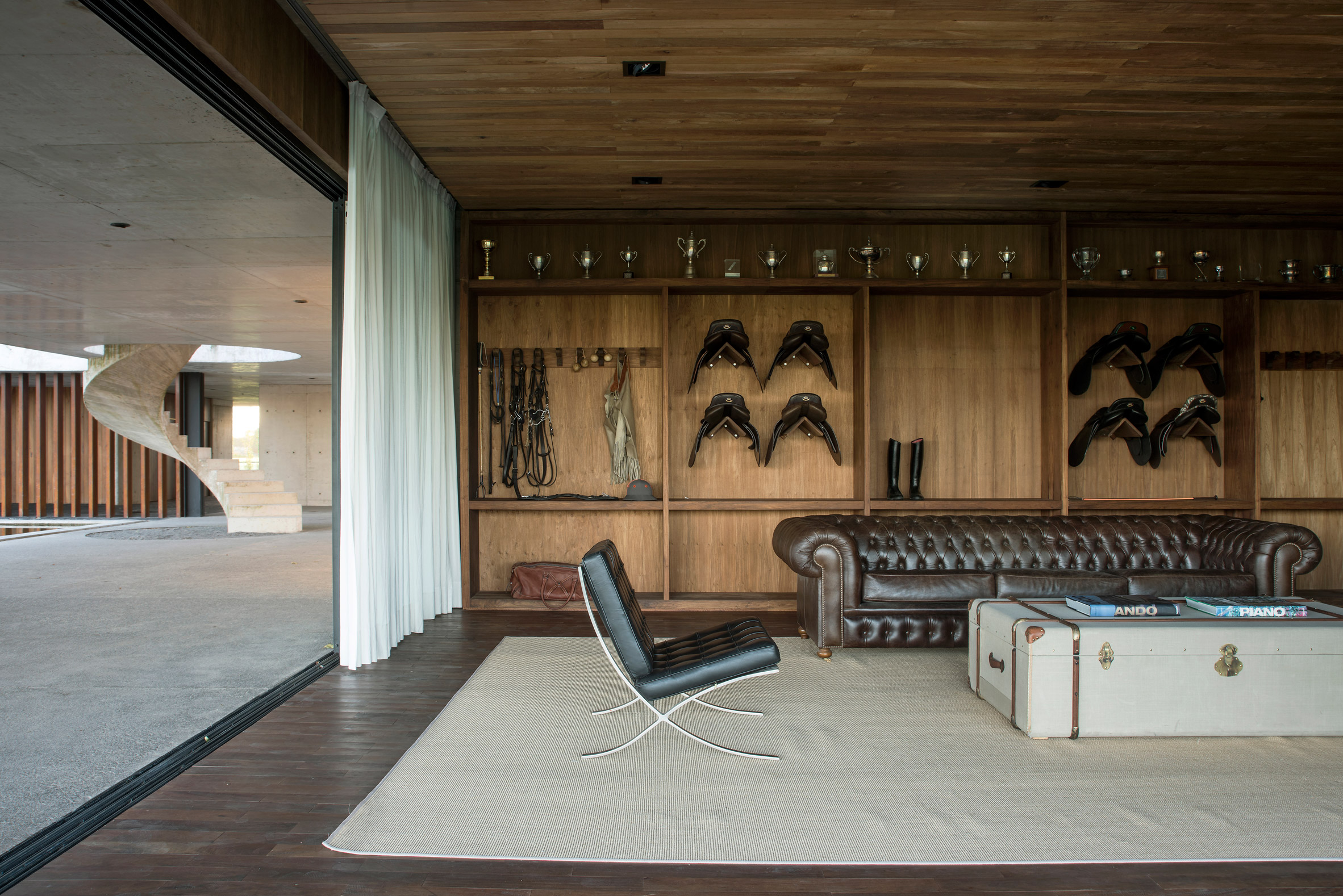 Polo stables features grassy roof for horses to graze and spectators to sit-9