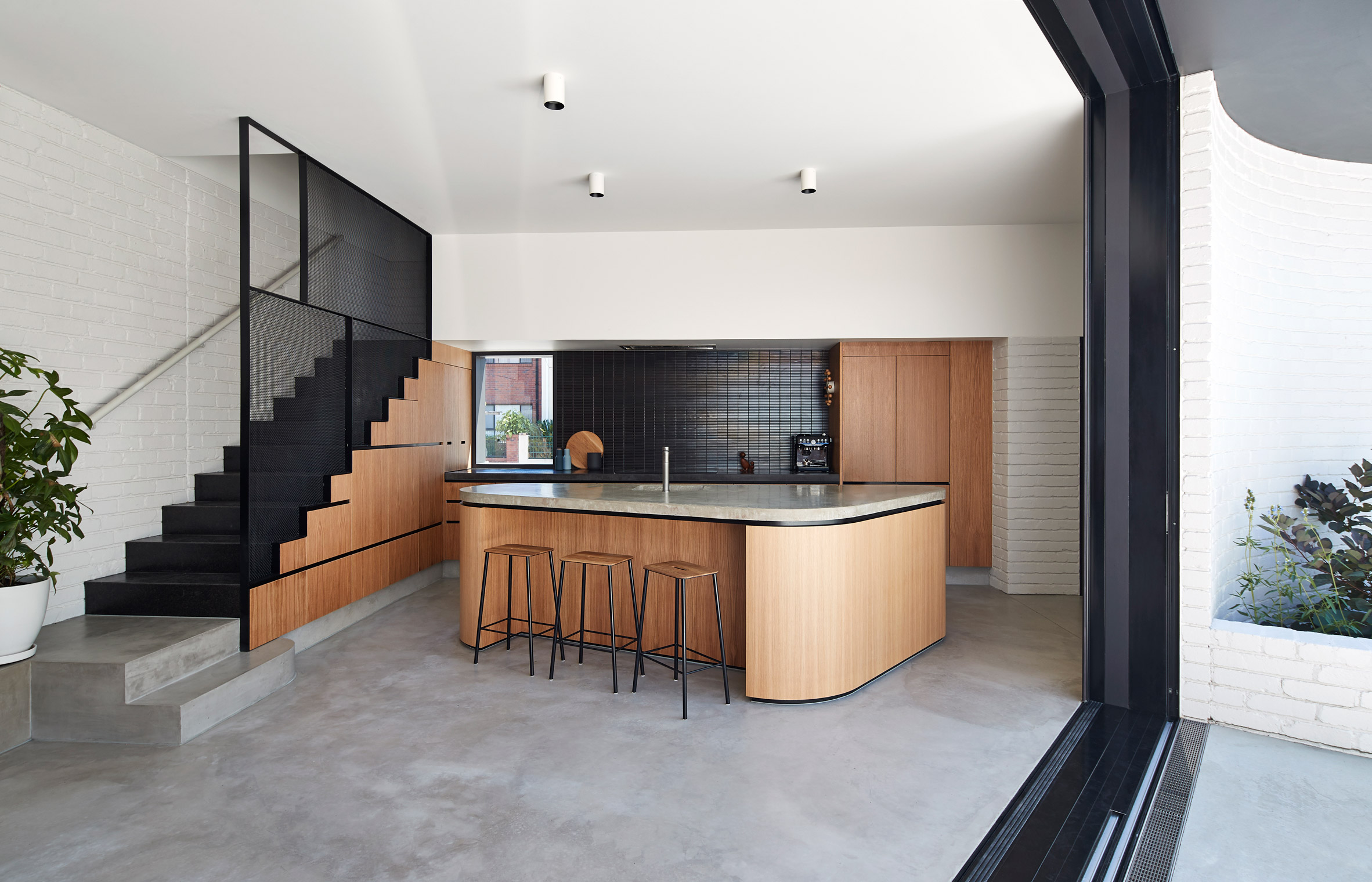 Perimeter House encloses private courtyard and swimming pool in Melbourne-5