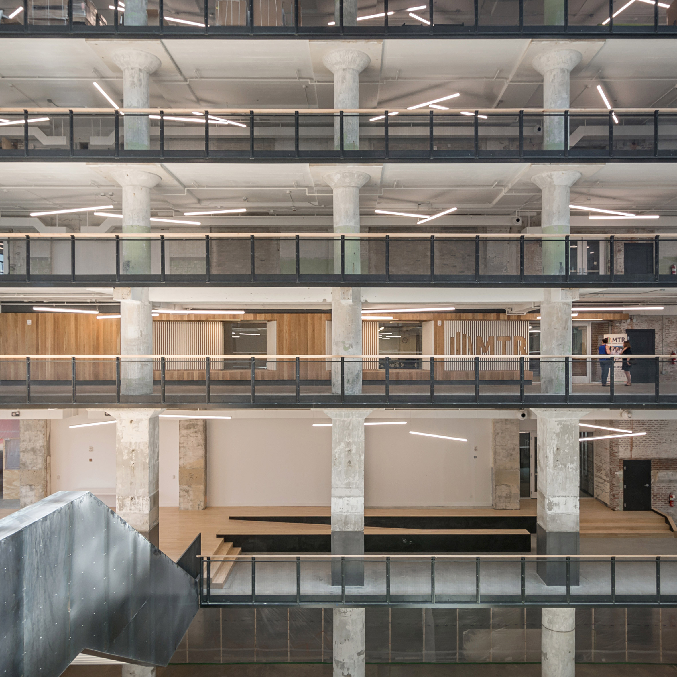 Archimania transforms Memphis warehouse into teacher training centre-0