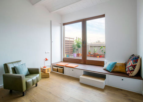 Barcelona apartment renovation by Nook with tiles and window seat-12