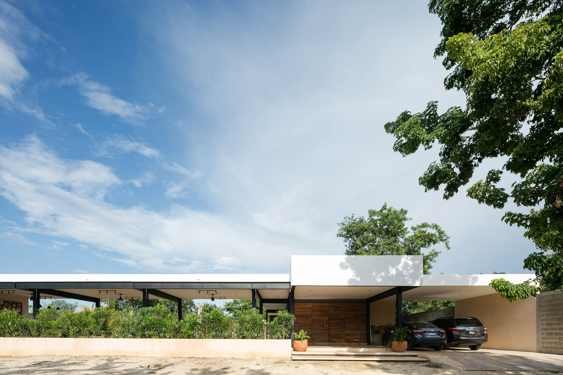 Steel colonnades create sheltered outdoor spaces at Mexican hacienda-18
