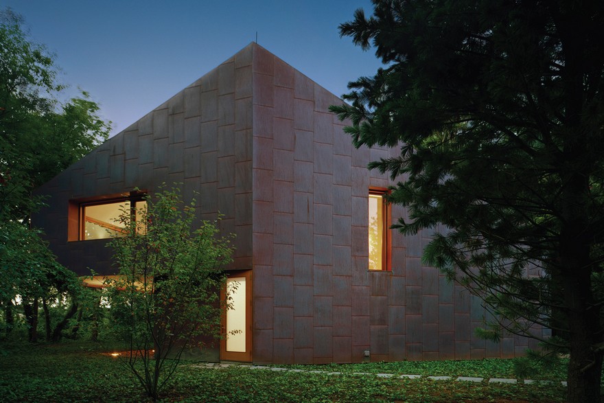 This Copper-Clad Writer’s Studio Changes Color in the Shifting Light of the Day-21