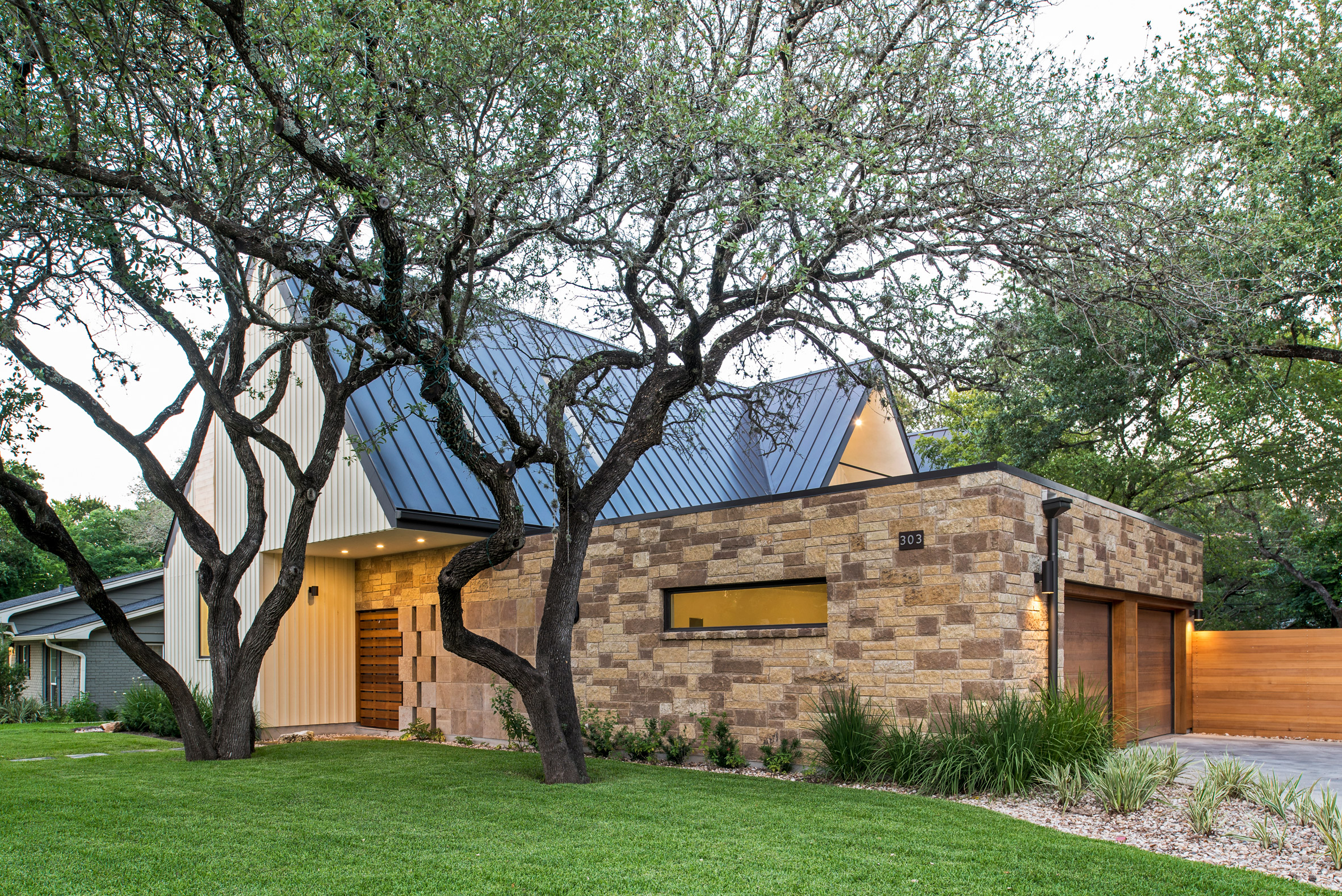 Gable wall conceals double-height atrium in Austin home by Design Hound-3