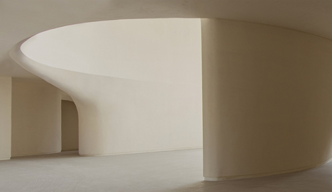 Next Office covers house near Tehran in a curved concrete facade-13