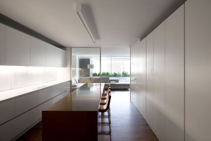 house built into the city-4