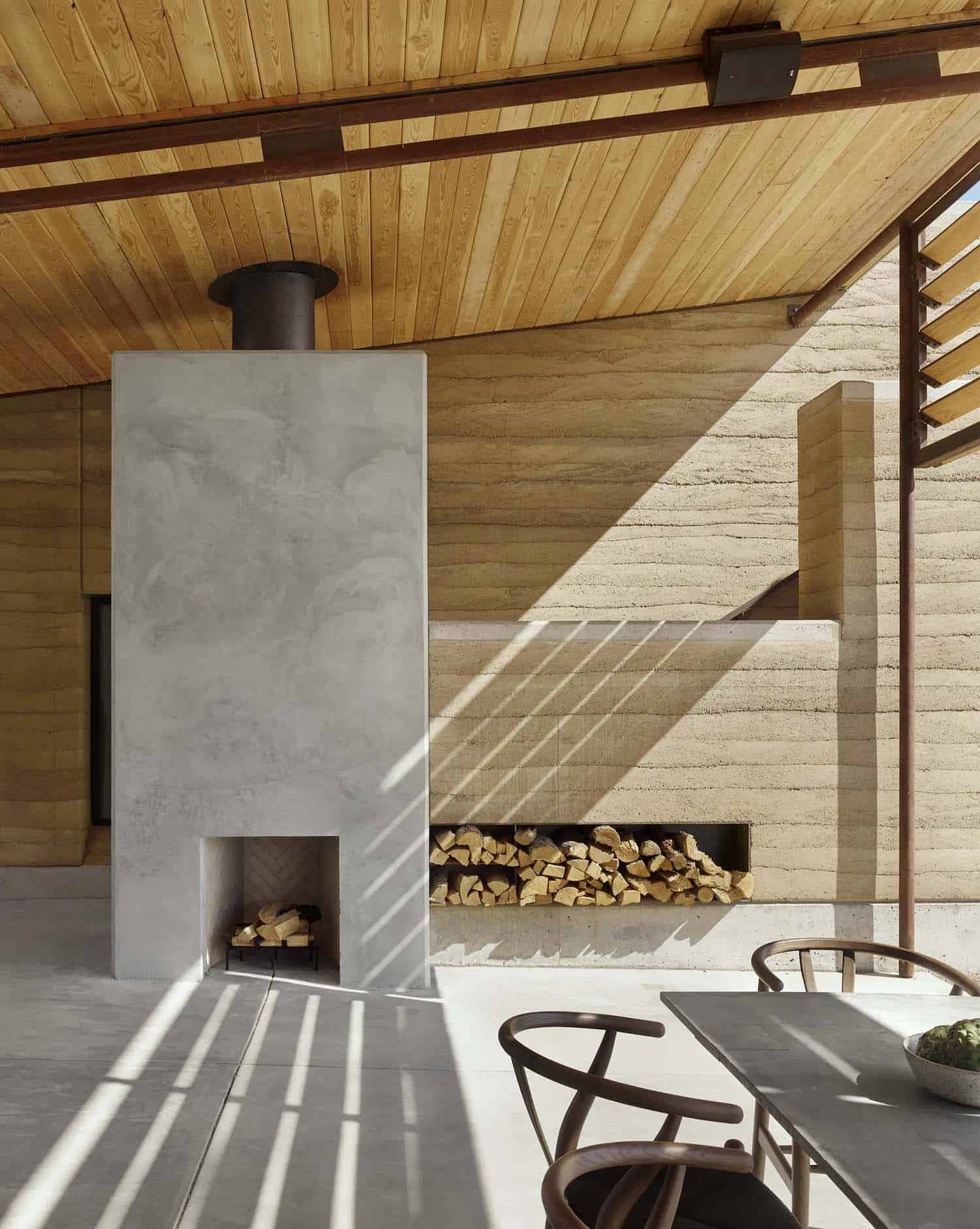 See this remarkable rammed earth house nestled on a Texas ranch-24