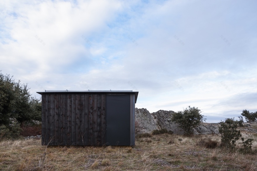 西班牙文化遗址旁的可逆式木钢展馆-43