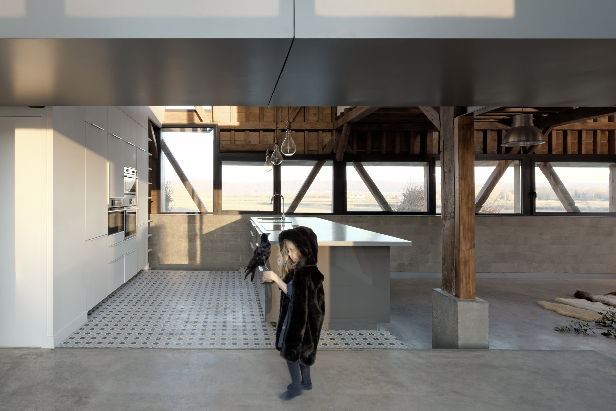 Antonin Ziegler covers abandoned barn in zinc plates to create rustic home in northern France-15