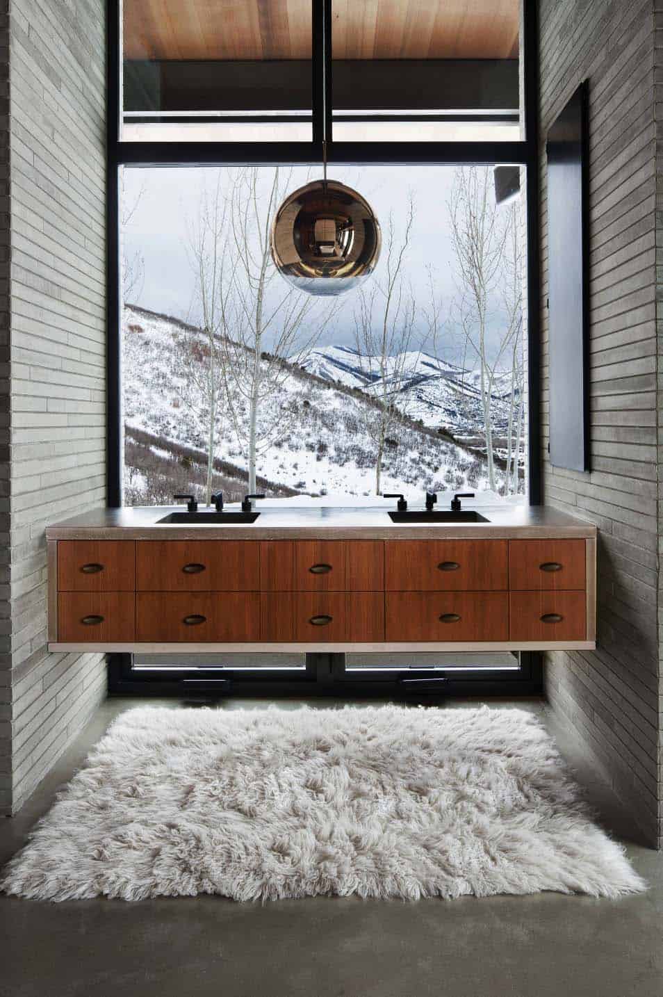 Majestic mountain home of stone and glass dominates its Utah landscape-14