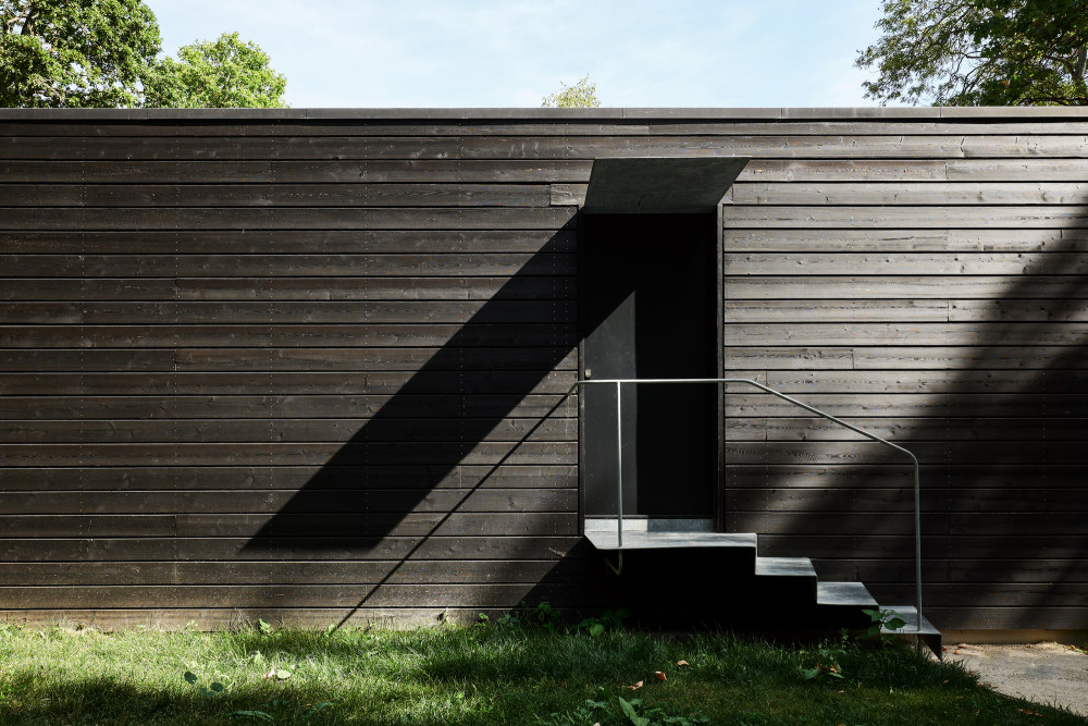 法国 V 字住宅 | 嵌入林间的自然几何空间-24